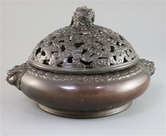 A large Chinese bronze censer, 17th/18th century with 16th/17th century bronze cover, W. 28cm